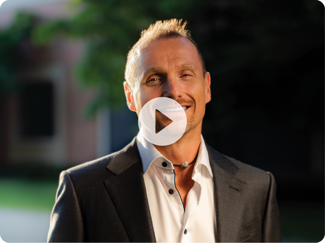 Joe Hudicka, co-founder of Evenflow, smiling confidently in a video thumbnail, inviting users to request access and join the AI Ecosystems Revolution.