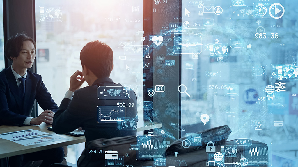 Business professionals discussing technology strategy with AI data overlays, featured in Evenflow blog "We Need to Talk About AI Risk Management"